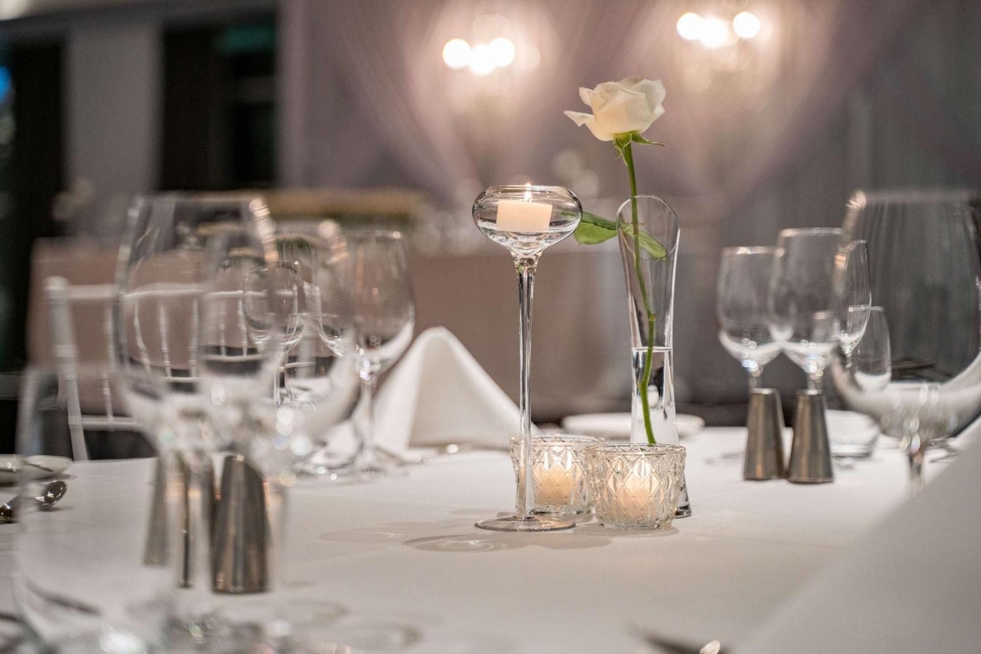 Hilton Auckland Hotel Exterior photo A table set for fine dining