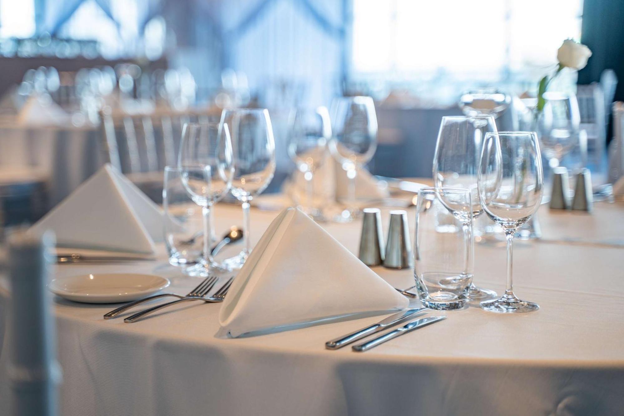 Hilton Auckland Hotel Exterior photo A table set for fine dining